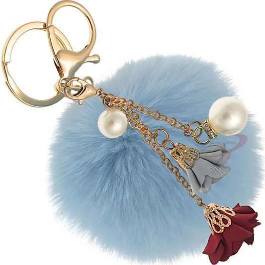 View details for iAccessories Rose Pearl Pom Pom Keychain - Light Blue iAccessories Rose Pearl Pom Pom Keychain - Light Blue